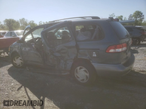 2002 Toyota Sienna LE with VIN 4T3ZF13C22U497021, listed as a Copart auction lot 52571055 with 232,973 mi miles and Salvage Title. Bid and sale history available at DreamBid. Image 2.