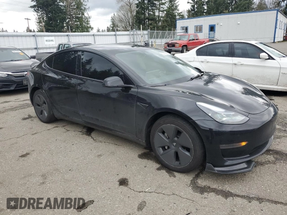 2023 Tesla Model 3 with VIN 5YJ3E1EA3PF644898, listed as a Copart auction lot 50427685 with 36,488 mi miles and Salvage Title. Bid and sale history available at DreamBid. Image 4.