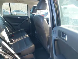 2014 Volkswagen Tiguan S z VIN WVGBV3AX4EW581302, wystawiony jako IAAI lot #41033175 z przebiegiem 69 791 mil mil oraz . Historia ofert i sprzedaży dostępna na DreamBid. Obrazek 8.