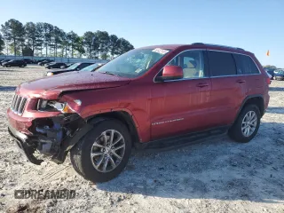 2014 Jeep Grand Cherokee Laredo with VIN 1C4RJEAG2EC475183, listed as a Copart auction lot 52422105 with 215,324 mi miles and Salvage Title. Bid and sale history available at carsss.com. Image 1.