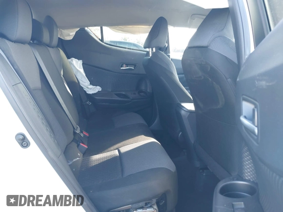 2020 Toyota C-HR LE with VIN JTNKHMBX6L1076433, listed as a IAAI auction lot 40975841 with 20,687 mi miles. Bid and sale history available at carsss.com. Image 8.