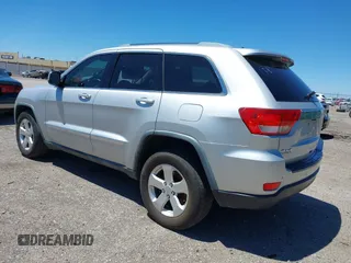 2011 Jeep Grand Cherokee Laredo with VIN 1J4RR4GG2BC737400, listed as a IAAI auction lot 42259167 with 153,211 mi miles and . Bid and sale history available at DreamBid. Image 3.