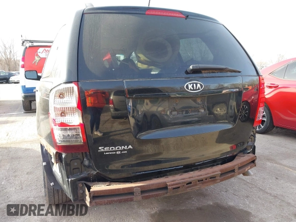 2011 Kia Sedona LX with VIN KNDMG4C70B6411556, listed as a IAAI auction lot 41768777 with 124,180 mi miles. Bid and sale history available at carsss.com. Image 6.