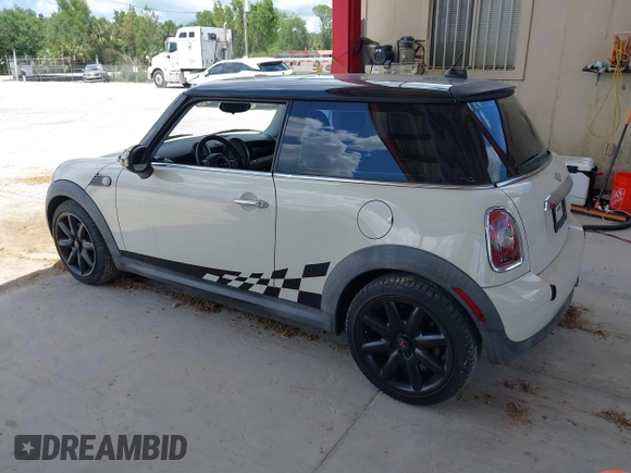 2007 MINI Hardtop with VIN WMWMF33557TL67653, listed as a IAAI auction lot 42581219 with 147,115 mi miles and . Bid and sale history available at DreamBid. Image 3.