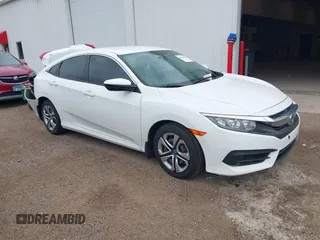 2017 Honda Civic LX z VIN 19XFC2F52HE039935, wystawiony jako IAAI lot #42168631 z przebiegiem 112 411 mil mil oraz . Historia ofert i sprzedaży dostępna na DreamBid. Obrazek 1.