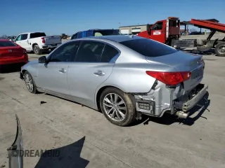 2014 Infiniti Q50 Hybrid Premium with VIN JN1AV7AP1EM692234, listed as a Copart auction lot 48697525 with 104,586 mi miles and Salvage Title. Bid and sale history available at DreamBid. Image 2.