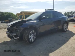 2024 Tesla Model Y Long Range z VIN 7SAYGDEE4RA283205, wystawiony jako Copart lot #61495615 z przebiegiem 11 791 mil mil oraz Szkoda całkowita • Salvage title. Historia ofert i sprzedaży dostępna na DreamBid. Obrazek 1.