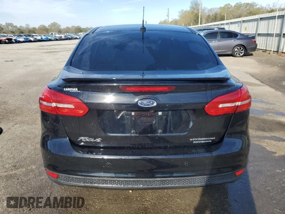 2016 Ford Focus Titanium with VIN 1FADP3J22GL201721, listed as a Copart auction lot 50633795 with 29,801 mi miles and Salvage title. Bid and sale history available at DreamBid. Image 6.