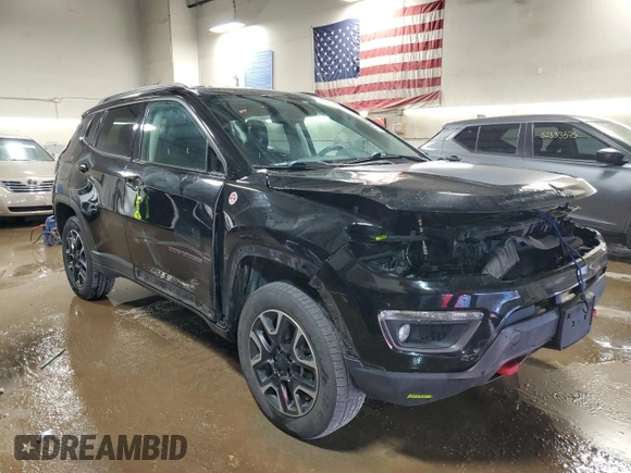 2019 Jeep Compass Trailhawk with VIN 3C4NJDDB1KT660608, listed as a Copart auction lot 51926615 with 81,047 mi miles and Salvage Title. Bid and sale history available at DreamBid. Image 4.