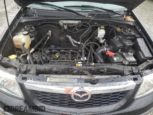 2011 Mazda Tribute Touring with VIN 4F2CY0C79BKM01536, listed as a Copart auction lot 43838095 with 68,271 mi miles and Salvage Title. Bid and sale history available at carsss.com. Image 12.