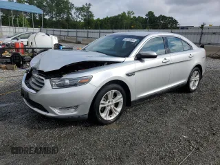 2015 Ford Taurus SEL with VIN 1FAHP2E89FG163034, listed as a Copart auction lot 59134655 with 179,944 mi miles and Salvage title. Bid and sale history available at DreamBid. Image 1.