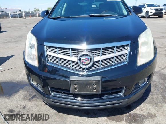 2012 Cadillac SRX Performance Collection z VIN 3GYFNBE30CS659973, wystawiony jako IAAI lot #42555119 z przebiegiem 141 842 mil mil oraz . Historia ofert i sprzedaży dostępna na DreamBid. Obrazek 12.