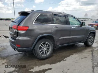 2018 Jeep Grand Cherokee Limited with VIN 1C4RJEBG1JC300335, listed as a Copart auction lot 61853325 with 107,137 mi miles and Salvage title. Bid and sale history available at DreamBid. Image 3.