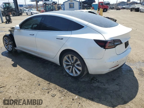2019 Tesla Model 3 Mid Range with VIN 5YJ3E1EA0KF466585, listed as a Copart auction lot 50313695 with 70,703 mi miles and Salvage Title. Bid and sale history available at carsss.com. Image 2.