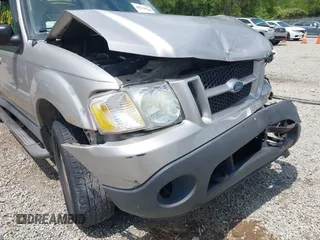 2005 Ford Explorer Sport Trac XLS z VIN 1FMZU77K55UB51889, wystawiony jako IAAI lot #42279164 z przebiegiem 210 081 mil mil oraz . Historia ofert i sprzedaży dostępna na DreamBid. Obrazek 17.
