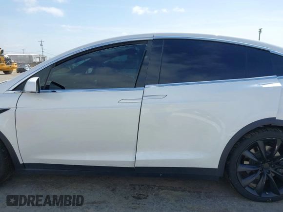 2021 Tesla Model X Long Range Plus with VIN 5YJXCBE23MF321243, listed as a IAAI auction lot 42100580 with 59,878 mi miles and . Bid and sale history available at carsss.com. Image 14.