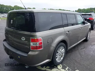 2014 Ford Flex SEL z VIN 2FMGK5C88EBD10549, wystawiony jako IAAI lot #42349426 z przebiegiem 123 903 mil mil oraz . Historia ofert i sprzedaży dostępna na DreamBid. Obrazek 4.