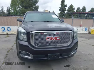 2015 GMC Yukon SLT with VIN 1GKS1BKC6FR245564, listed as a IAAI auction lot 42139295 with 149,088 mi miles. Bid and sale history available at carsss.com. Image 12.