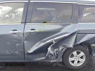 2013 Nissan Quest LE with VIN JN8AE2KP2D9066986, listed as a IAAI auction lot 41022861 with 122,869 mi miles. Bid and sale history available at carsss.com. Image 6.