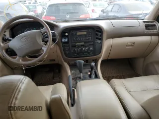 1999 Toyota Land Cruiser with VIN JT3HT05J1X0038590, listed as a Copart auction lot 87452404 with 232,244 mi miles and Salvage Title. Bid and sale history available at carsss.com. Image 8.