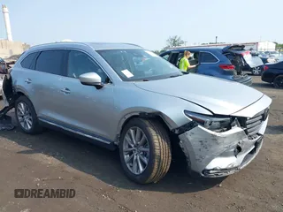 2020 Mazda CX-9 Grand Touring with VIN JM3TCBDY6L0424584, listed as a IAAI auction lot 42473920 with 32,385 mi miles and . Bid and sale history available at DreamBid. Image 1.