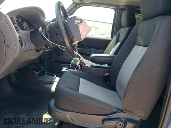 2011 Ford Ranger XLT with VIN 1FTLR4FE5BPA70682, listed as a Copart auction lot 62114555 with 58,319 mi miles and Salvage title. Bid and sale history available at DreamBid. Image 7.
