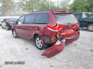 2013 Toyota Sienna LE AAS with VIN 5TDKK3DC1DS368585, listed as a IAAI auction lot 42070311 with 181,408 mi miles. Bid and sale history available at carsss.com. Image 3.