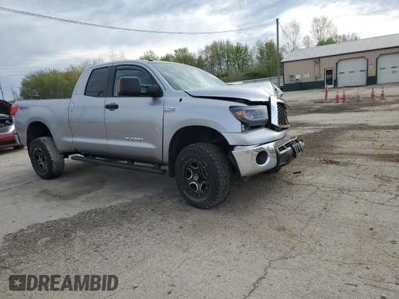 2010 Toyota Tundra с VIN 5TFUW5F14AX124598, выставлен на аукционе Copart как лот 54363625 с пробегом 149 268 миль миль и Списание • Salvage title. История ставок и продаж доступна на DreamBid. Изображение 4.