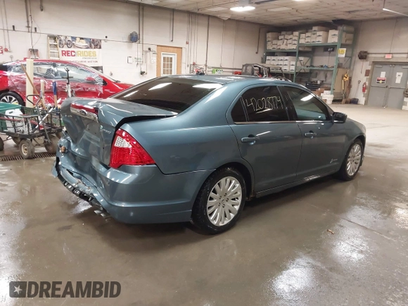 2012 Ford Fusion Hybrid z VIN 3FADP0L31CR443545, wystawiony jako IAAI lot #42028774 z przebiegiem 194 365 mil mil oraz . Historia ofert i sprzedaży dostępna na DreamBid. Obrazek 4.