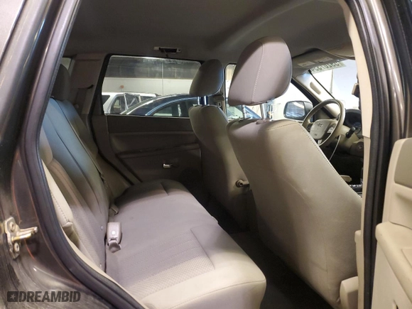 2006 Jeep Grand Cherokee Laredo with VIN 1J4GS48K26C285341, listed as a Copart auction lot 59287334 with 218,787 mi miles and Salvage Title. Bid and sale history available at carsss.com. Image 10.