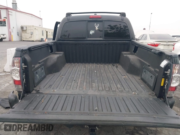 2009 Toyota Tacoma PreRunner with VIN 3TMJU62N99M076105, listed as a IAAI auction lot 42709523 with 206,948 mi miles and . Bid and sale history available at DreamBid. Image 18.