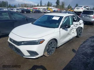 2024 Honda Civic Hatchback Sport with VIN 19XFL2H84RE002877, listed as a IAAI auction lot 41950230 with 15,752 mi miles. Bid and sale history available at carsss.com. Image 2.
