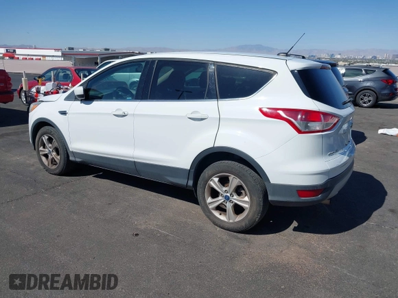 2013 Ford Escape SE with VIN 1FMCU9GX8DUA42581, listed as a IAAI auction lot 42088045 with 153,145 mi miles. Bid and sale history available at carsss.com. Image 3.
