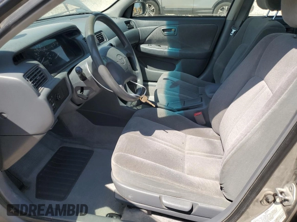 2000 Toyota Camry CE z VIN 4T1BG22K3YU009533, wystawiony jako Copart lot #48996855 z przebiegiem 132 705 mil mil oraz Szkoda całkowita • Salvage title. Historia ofert i sprzedaży dostępna na DreamBid. Obrazek 7.