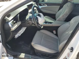 2023 Genesis G70 2.0T with VIN KMTG34TA2PU121330, listed as a Copart auction lot 55718144 with 19,599 mi miles and Salvage Title. Bid and sale history available at carsss.com. Image 7.