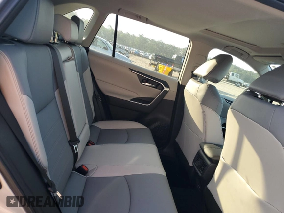 2024 Toyota RAV4 Hybrid XLE Premium z VIN 2T3B6RFV0RW074218, wystawiony jako Copart lot #56917295 z przebiegiem 14 969 mil mil oraz Szkoda całkowita • Salvage title. Historia ofert i sprzedaży dostępna na DreamBid. Obrazek 11.