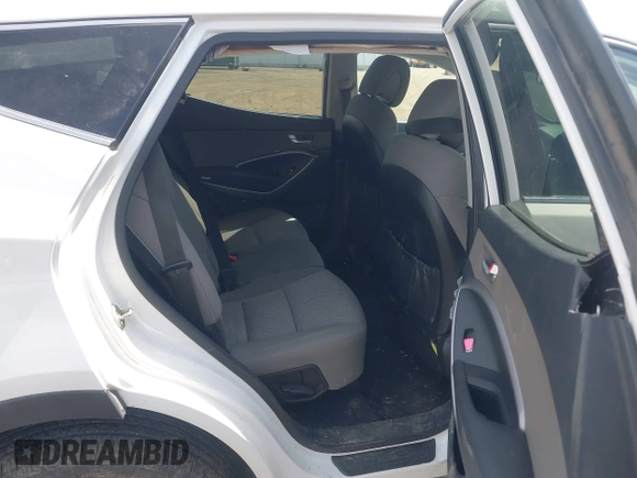 2016 Hyundai Santa Fe z VIN 5XYZTDLB9GG364375, wystawiony jako IAAI lot #42203404 z przebiegiem 143 838 mil mil oraz . Historia ofert i sprzedaży dostępna na DreamBid. Obrazek 8.