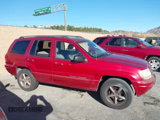 2002 Jeep Grand Cherokee Limited with VIN 1J8GX58N92C186560, listed as a IAAI auction lot 41383003 with 206,195 mi miles and . Bid and sale history available at DreamBid. Image 13.