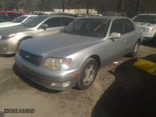 1999 Lexus LS 400 Luxury Sdn with VIN JT8BH28F4X0164365, listed as a IAAI auction lot 41508005 with 213,132 mi miles. Bid and sale history available at carsss.com. Image 2.