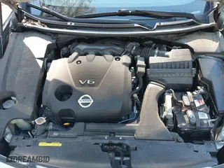2009 Nissan Maxima 3.5 S with VIN 1N4AA51E19C853663, listed as a IAAI auction lot 41327128 with 127,118 mi miles. Bid and sale history available at carsss.com. Image 10.