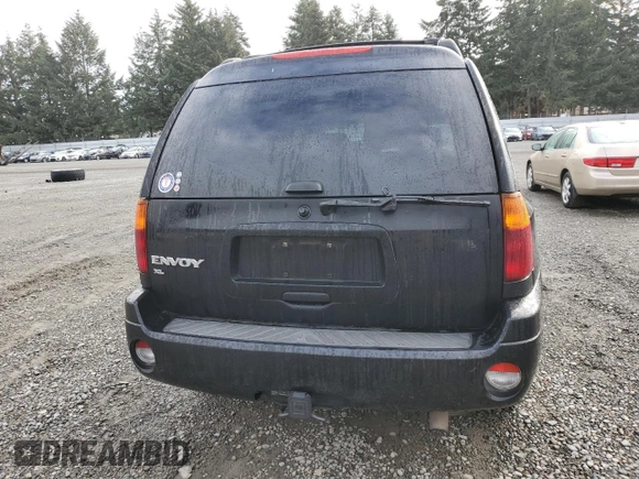 2003 GMC Envoy XL SLT with VIN 1GKES16S036191987, listed as a Copart auction lot 76776604 with 253,889 mi miles and Salvage Title. Bid and sale history available at carsss.com. Image 6.