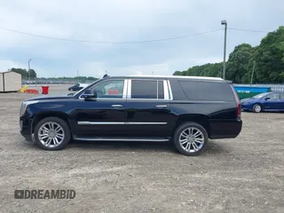 2017 Cadillac Escalade ESV Luxury with VIN 1GYS4HKJ4HR120256, listed as a IAAI auction lot 42561194 with 165,482 mi miles and . Bid and sale history available at DreamBid. Image 14.