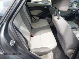2012 Ford Focus SE z VIN 1FAHP3F22CL125941, wystawiony jako IAAI lot #42176898 z przebiegiem 157 940 mil mil oraz . Historia ofert i sprzedaży dostępna na DreamBid. Obrazek 8.