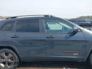 2016 Jeep Cherokee Latitude with VIN 1C4PJMCB2GW357736, listed as a IAAI auction lot 42017755 with 97,650 mi miles. Bid and sale history available at carsss.com. Image 13.