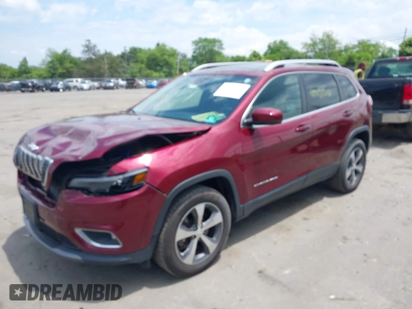 2019 Jeep Cherokee Limited with VIN 1C4PJMDXXKD323087, listed as a IAAI auction lot 42471210 with 57,839 mi miles and . Bid and sale history available at DreamBid. Image 2.