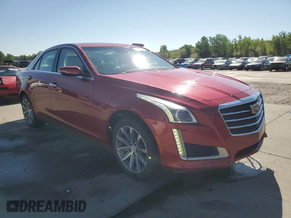 2016 Cadillac CTS Luxury Collection AWD with VIN 1G6AX5SX0G0128548, listed as a Copart auction lot 62783985 with 52,899 mi miles and Salvage title. Bid and sale history available at DreamBid. Image 4.