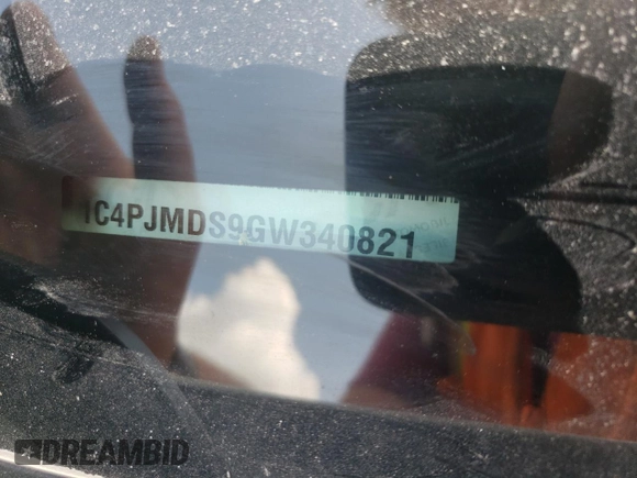 2016 Jeep Cherokee Limited z VIN 1C4PJMDS9GW340821, wystawiony jako Copart lot #54761795 z przebiegiem 98 114 mil mil oraz Szkoda całkowita • Salvage title. Historia ofert i sprzedaży dostępna na DreamBid. Obrazek 14.
