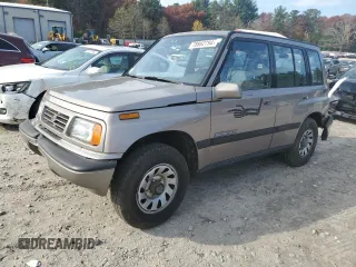 1995 Suzuki Sidekick JX z VIN 2S3TD03V2S6408939, wystawiony jako Copart lot #78862794 z przebiegiem 88 216 mil mil oraz Tytuł czysty. Historia ofert i sprzedaży dostępna na DreamBid. Obrazek 1.