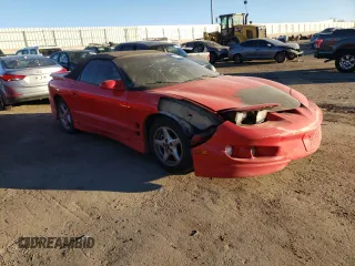 1999 Pontiac Firebird with VIN 2G2FS32K3X2233291, listed as a Copart auction lot 88819545 with 116,133 mi miles and Salvage Title. Bid and sale history available at carsss.com. Image 4.