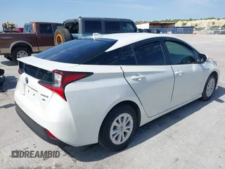 2020 Toyota Prius L Eco z VIN JTDKARFU8L3126291, wystawiony jako IAAI lot #42190242 z przebiegiem 60 404 mil mil oraz . Historia ofert i sprzedaży dostępna na DreamBid. Obrazek 4.